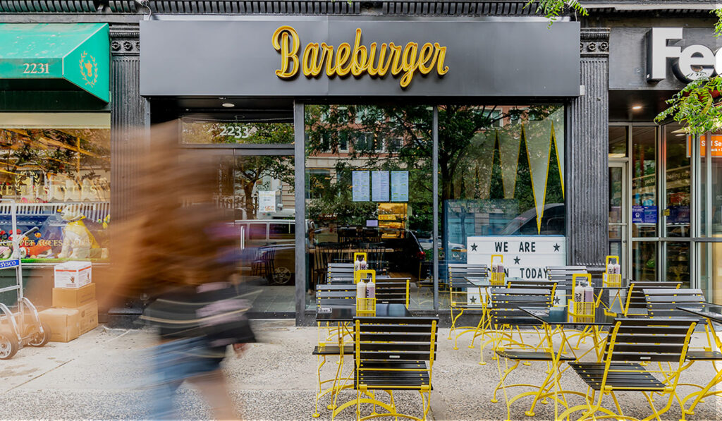 Bareburger-best-burger-restaurant-front-on-2233-Broadway-on-the-Upper-West-Side,-New-York-City-with-people-enjoying-delicious-sustainable-meals